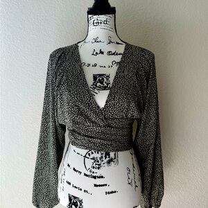 Polly 
Black and White Fitted Wrap Blouse